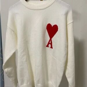Elegant White Sweater with Red Heart Accent